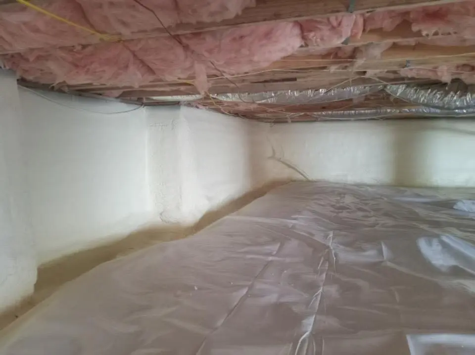 Crawl space encapsulation with closed-cell spray foam for Commercial Roof Restoration in Dayton